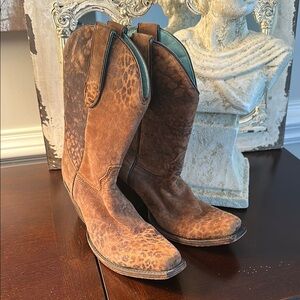 Corral animal print leather boots.